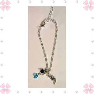 Bracelet - 8-9" - silver tone with wing & blue & black gems - New! No flaws.